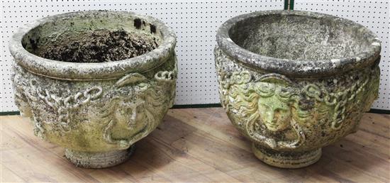 A pair of reconstituted stone garden urns, Diam. 1ft 8in. H.1ft 6in.